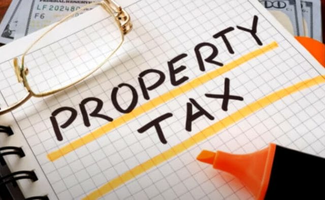 tax defaulted property is sold at tax lien auctions